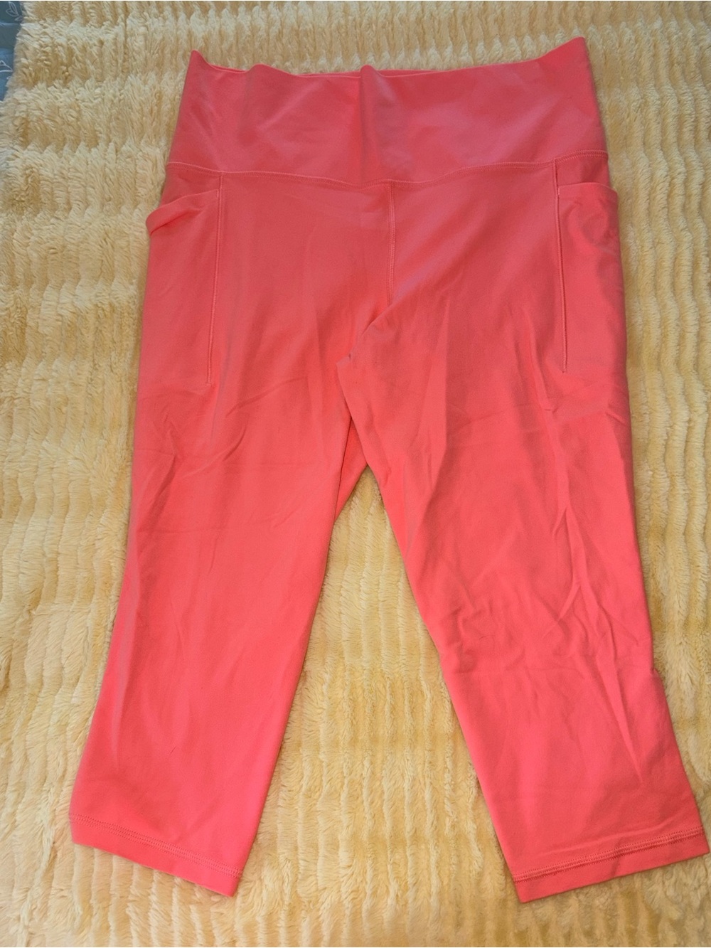 Athleta Salutation Stash Pocket Crop Capri Leggings in Coral